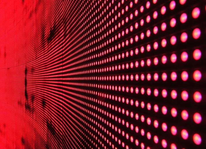 A wall of red neon dots