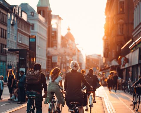 copenhagen group of cyclists at sunset