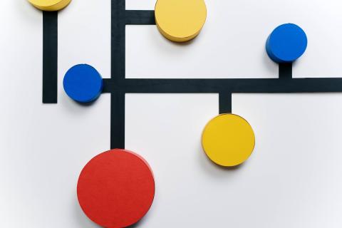 Six colored circles connected by thick black lines