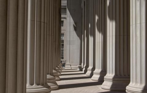 A row of large white columns outside